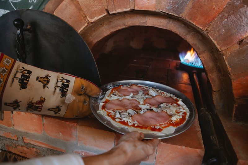 Punch pizza stone oven and authentic pizza making